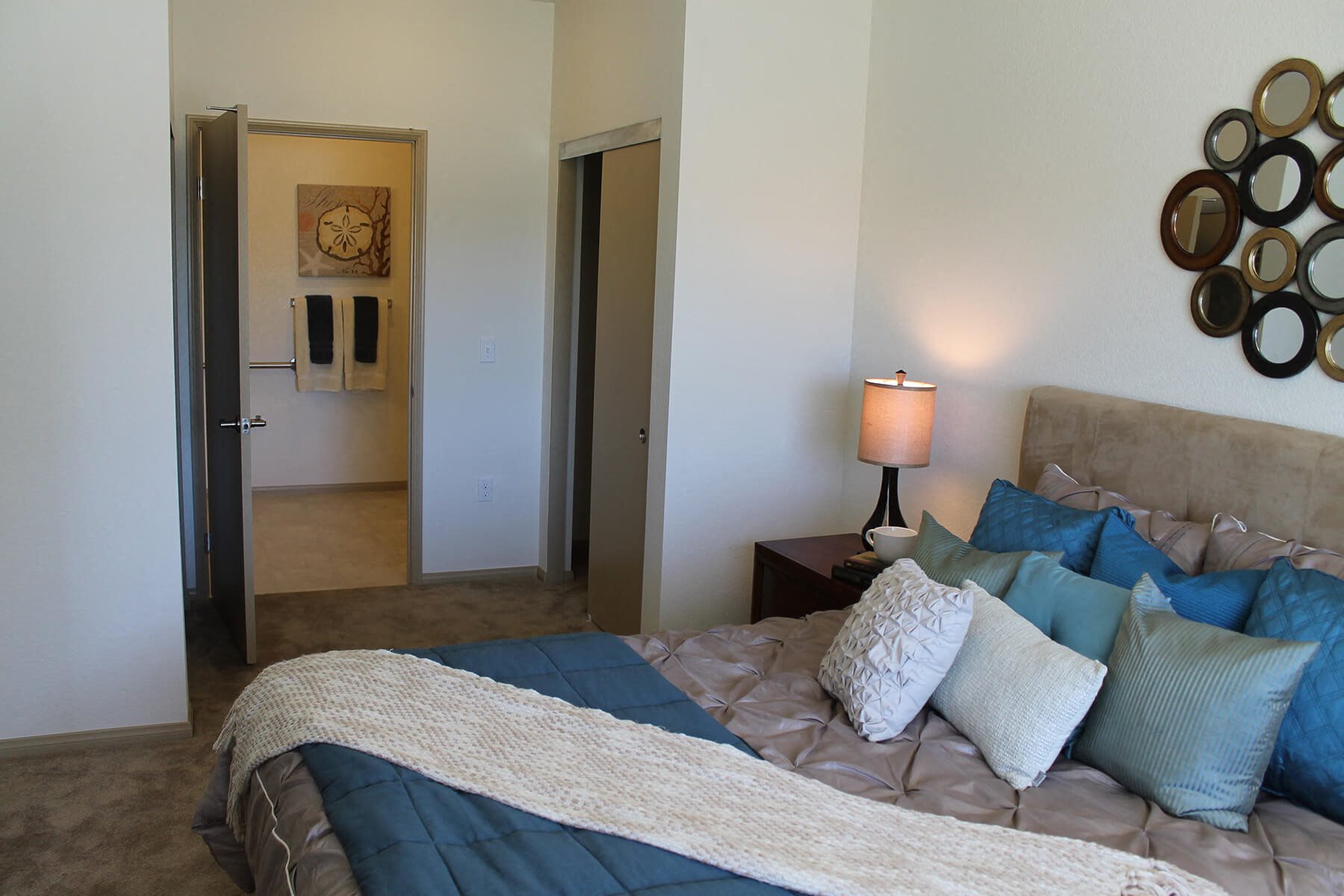 Model Bedroom Looking to Bathroom at The Lodge at Morgan Hills Apartments in Morgan Hill CA